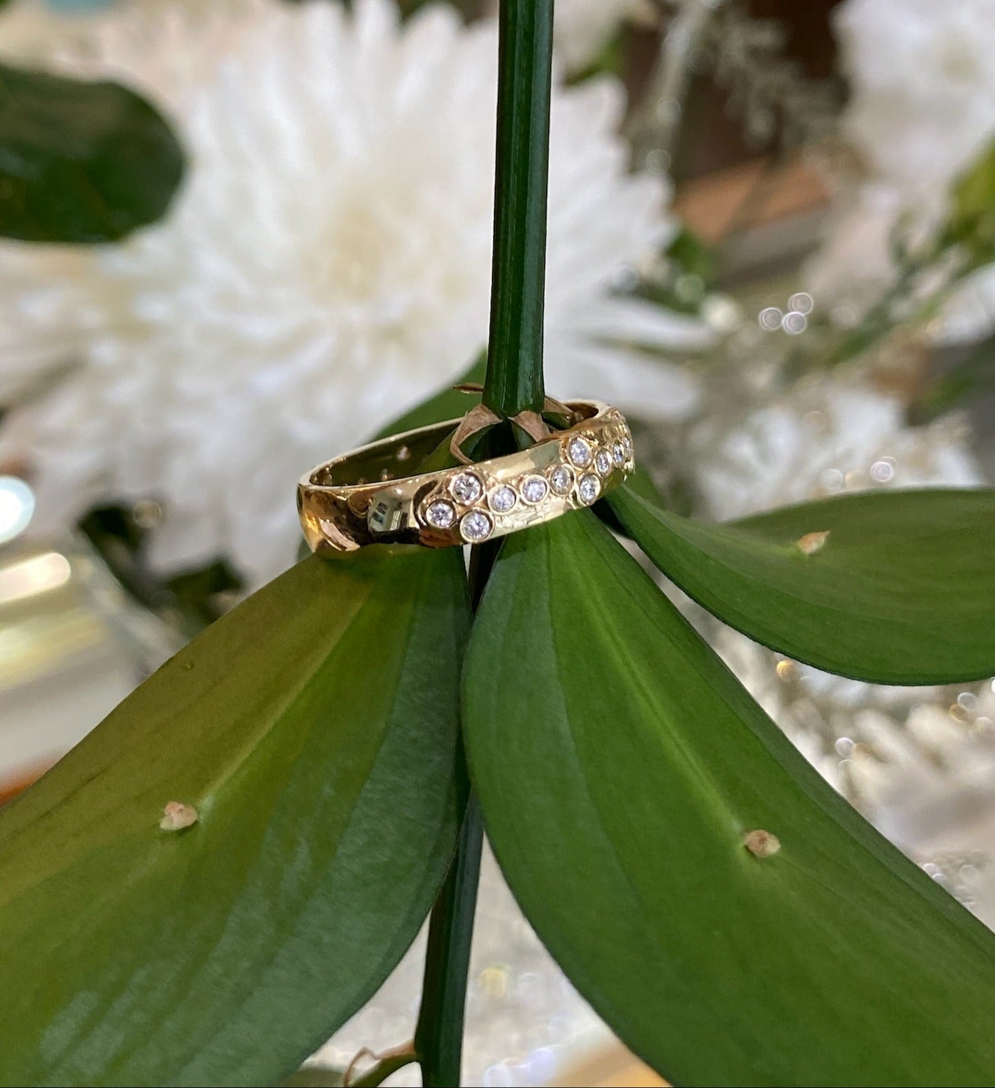 Yellow Gold Bezel Set Floral Pattern Diamond Band