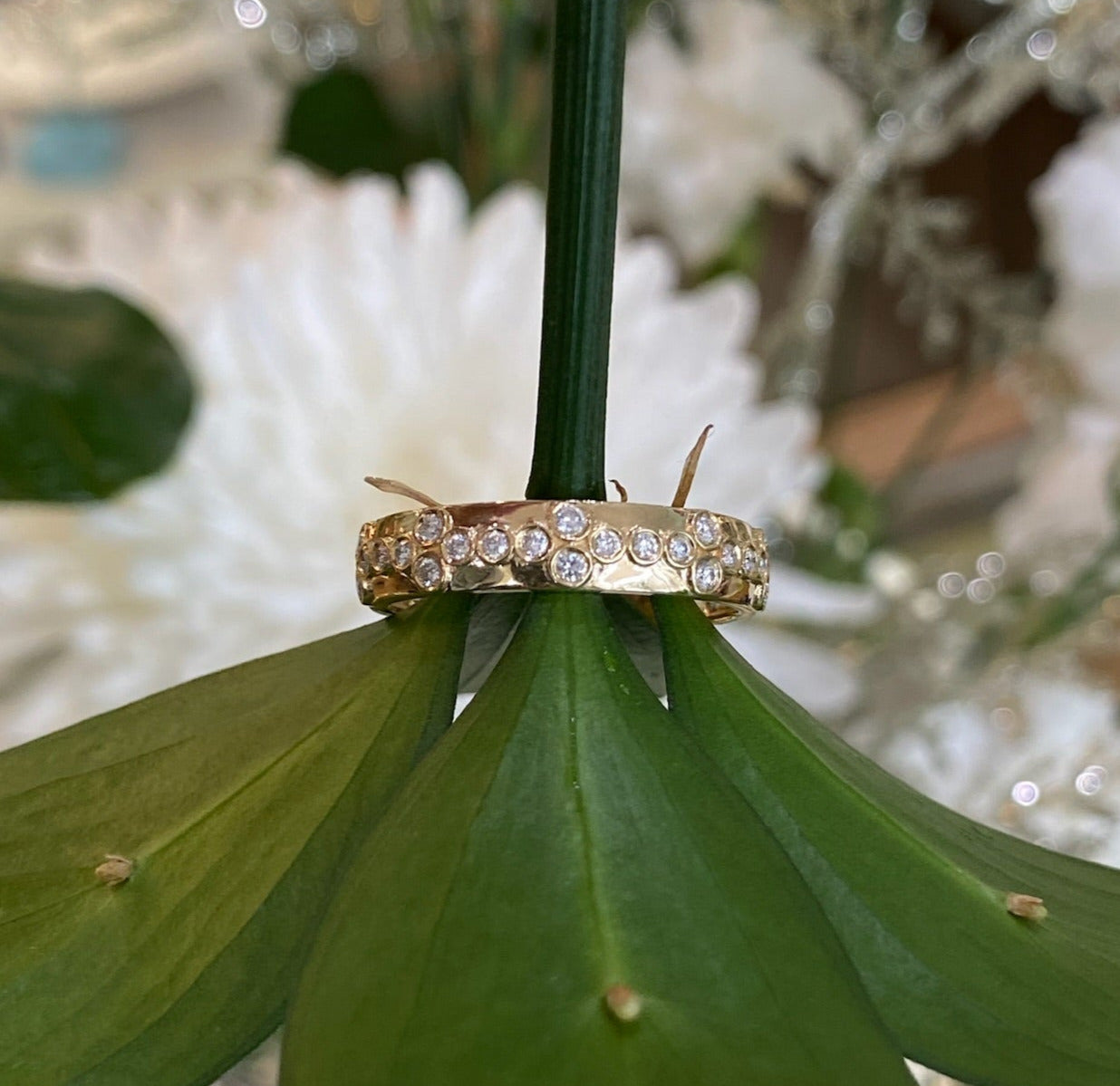 Yellow Gold Bezel Set Floral Pattern Diamond Band