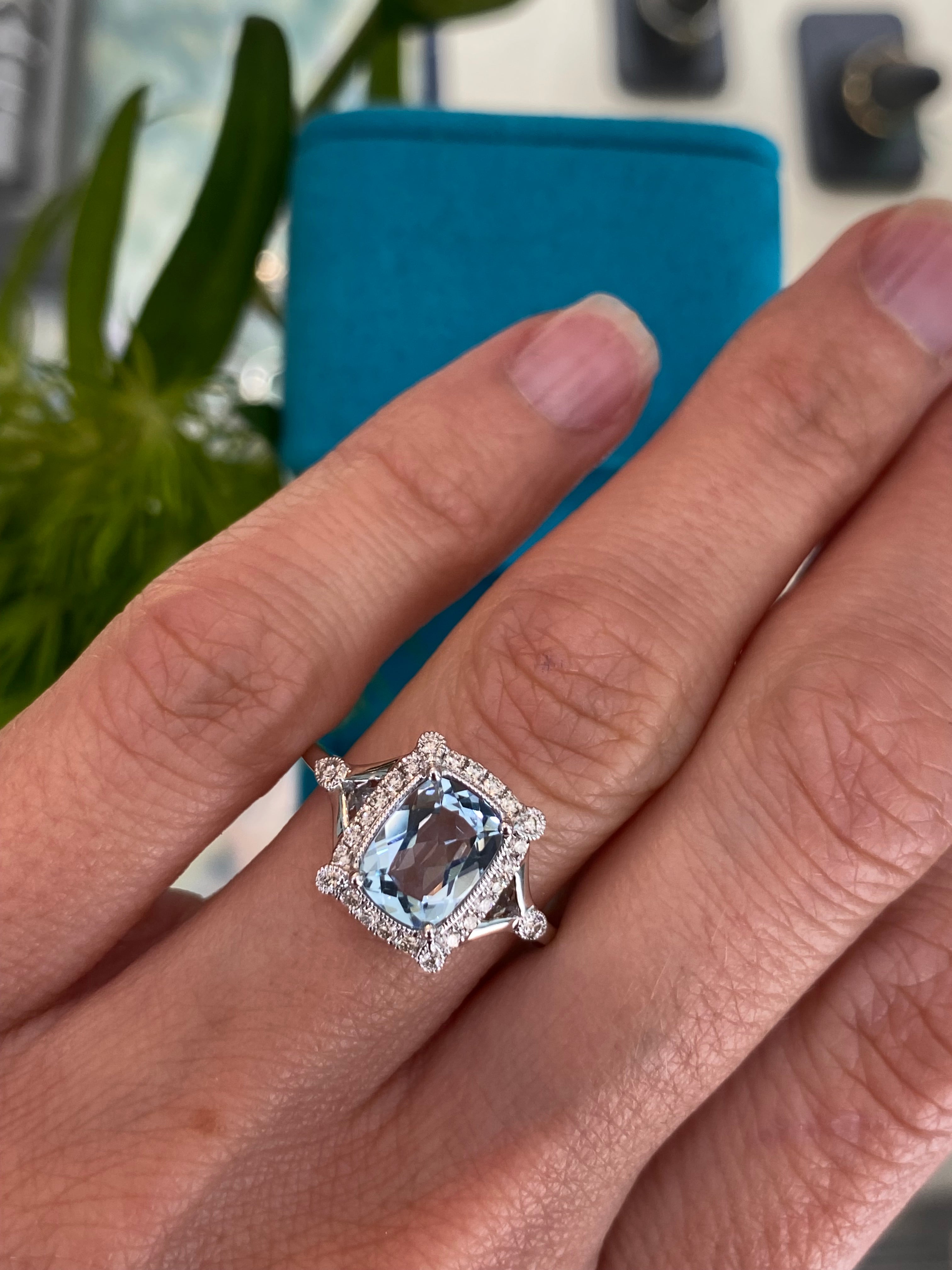 Aquamarine and Diamond Halo White Gold Ring