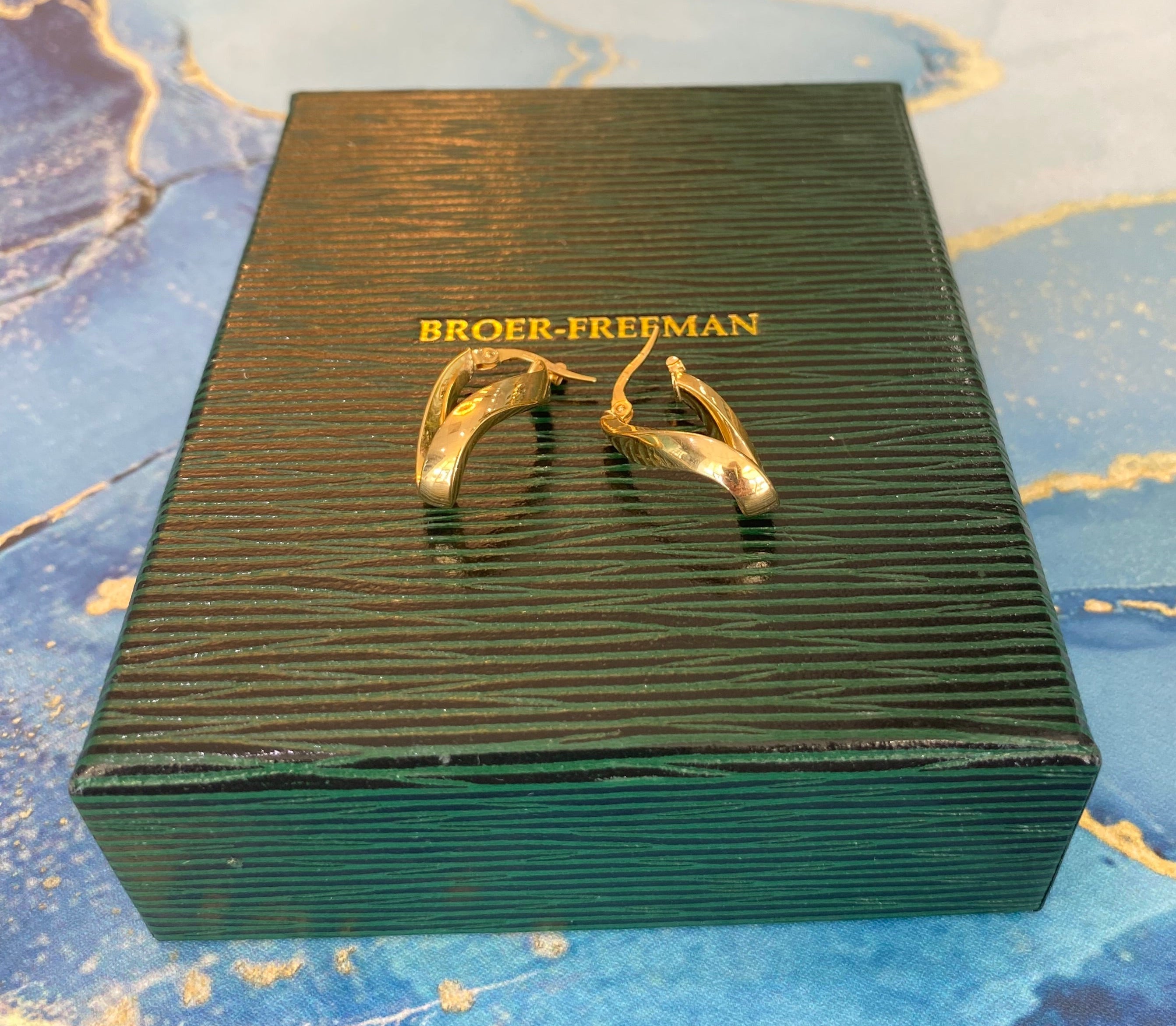 Yellow Gold Twisted Oval Hoops