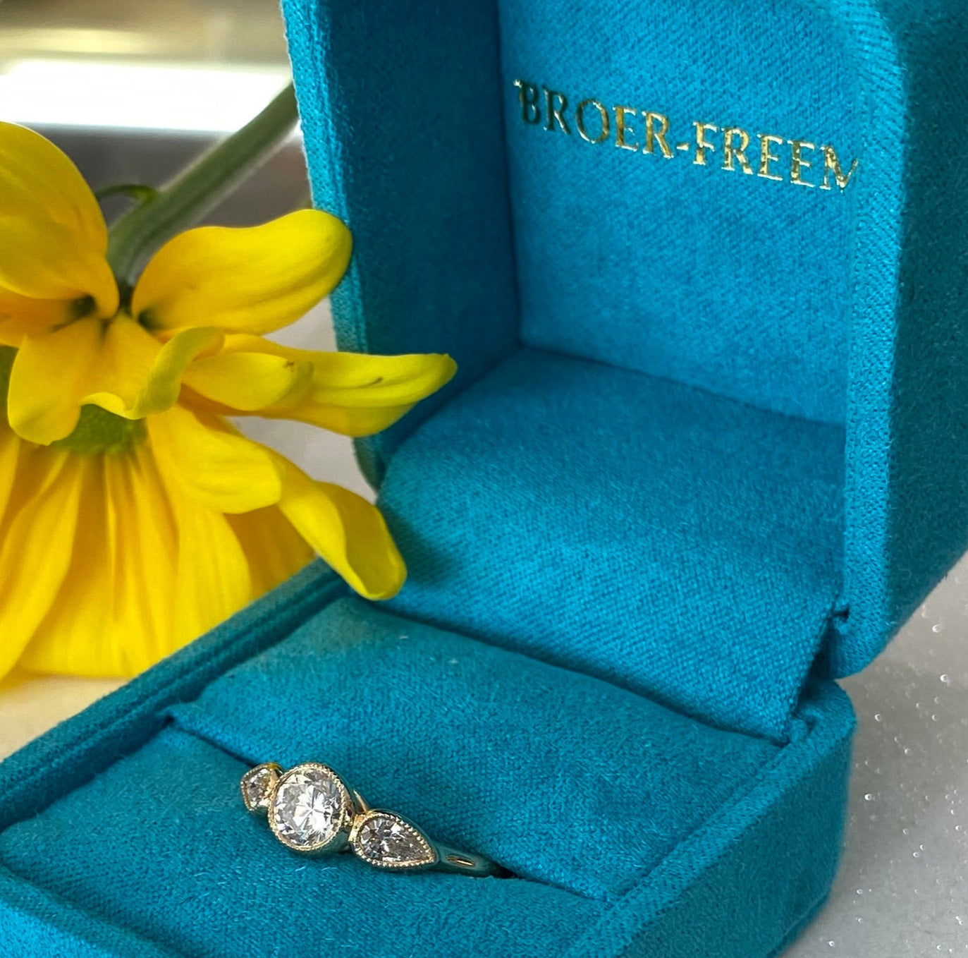 Three Diamond Round & Pear Yellow Gold Engagement Ring