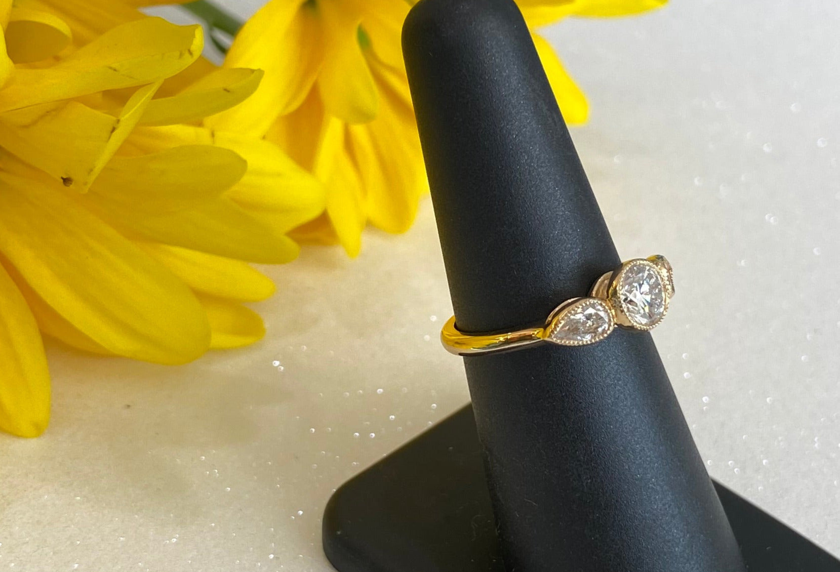 Three Diamond Round & Pear Yellow Gold Engagement Ring