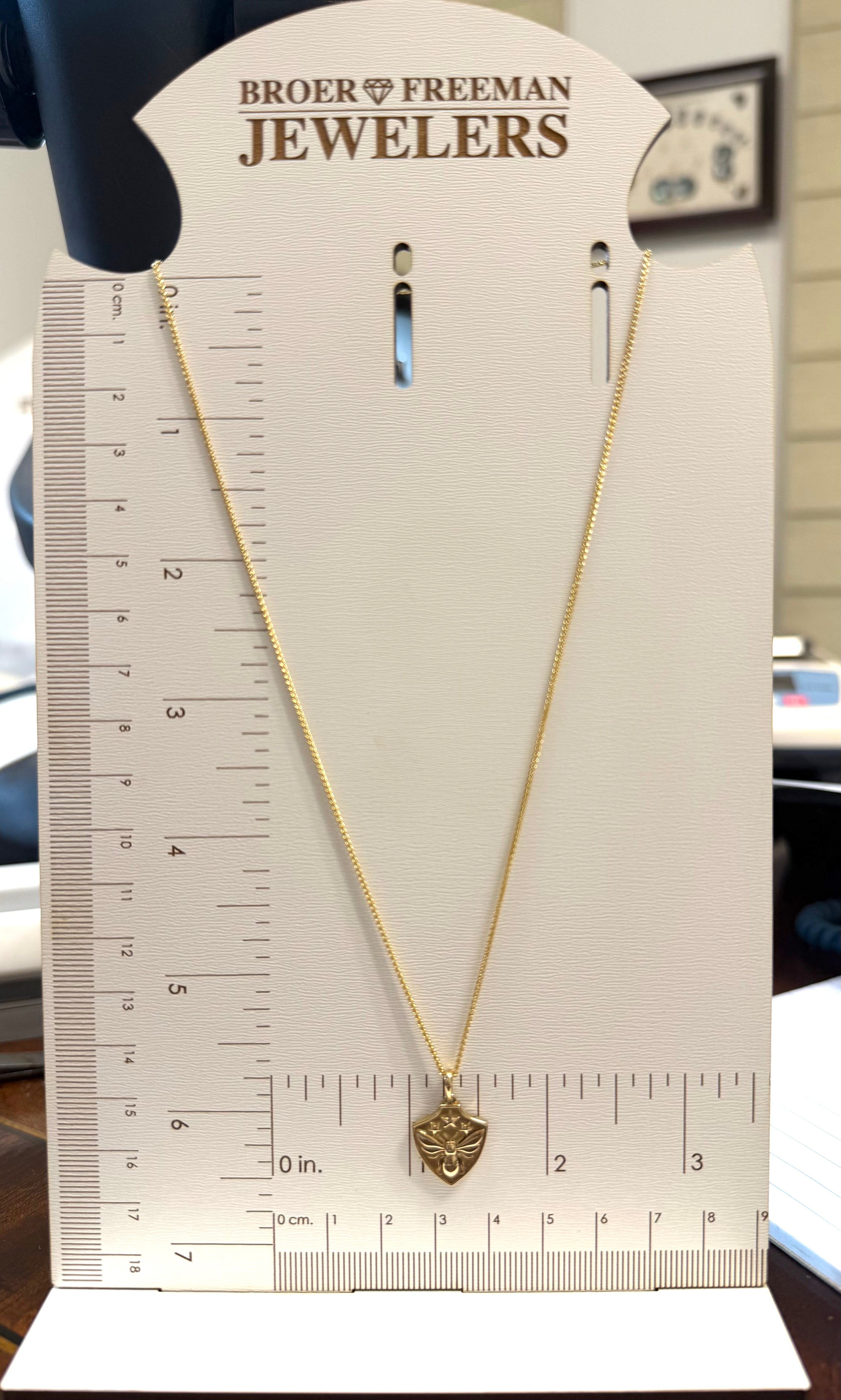 The Queen’s Crest Bee Pendant