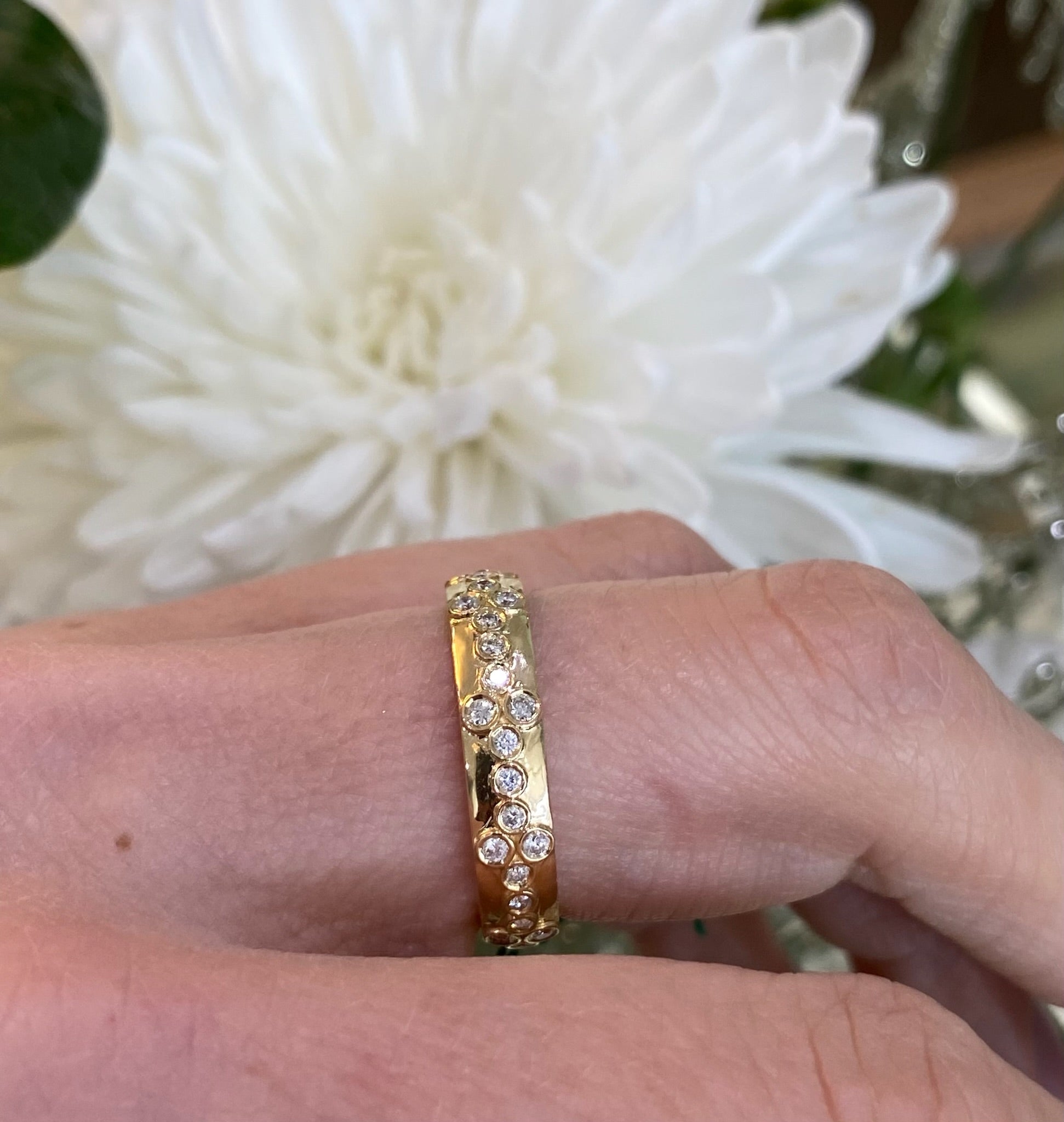 Yellow Gold Bezel Set Floral Pattern Diamond Band