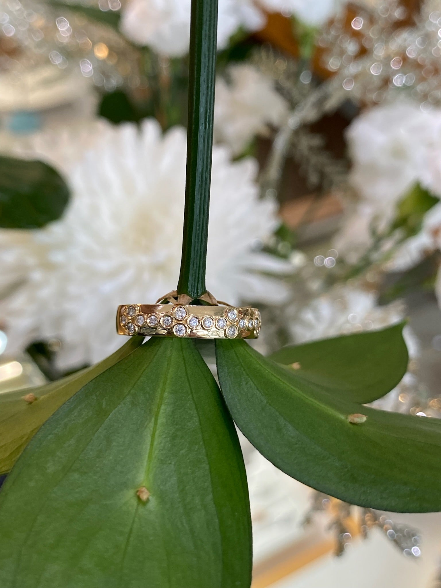 Yellow Gold Bezel Set Floral Pattern Diamond Band