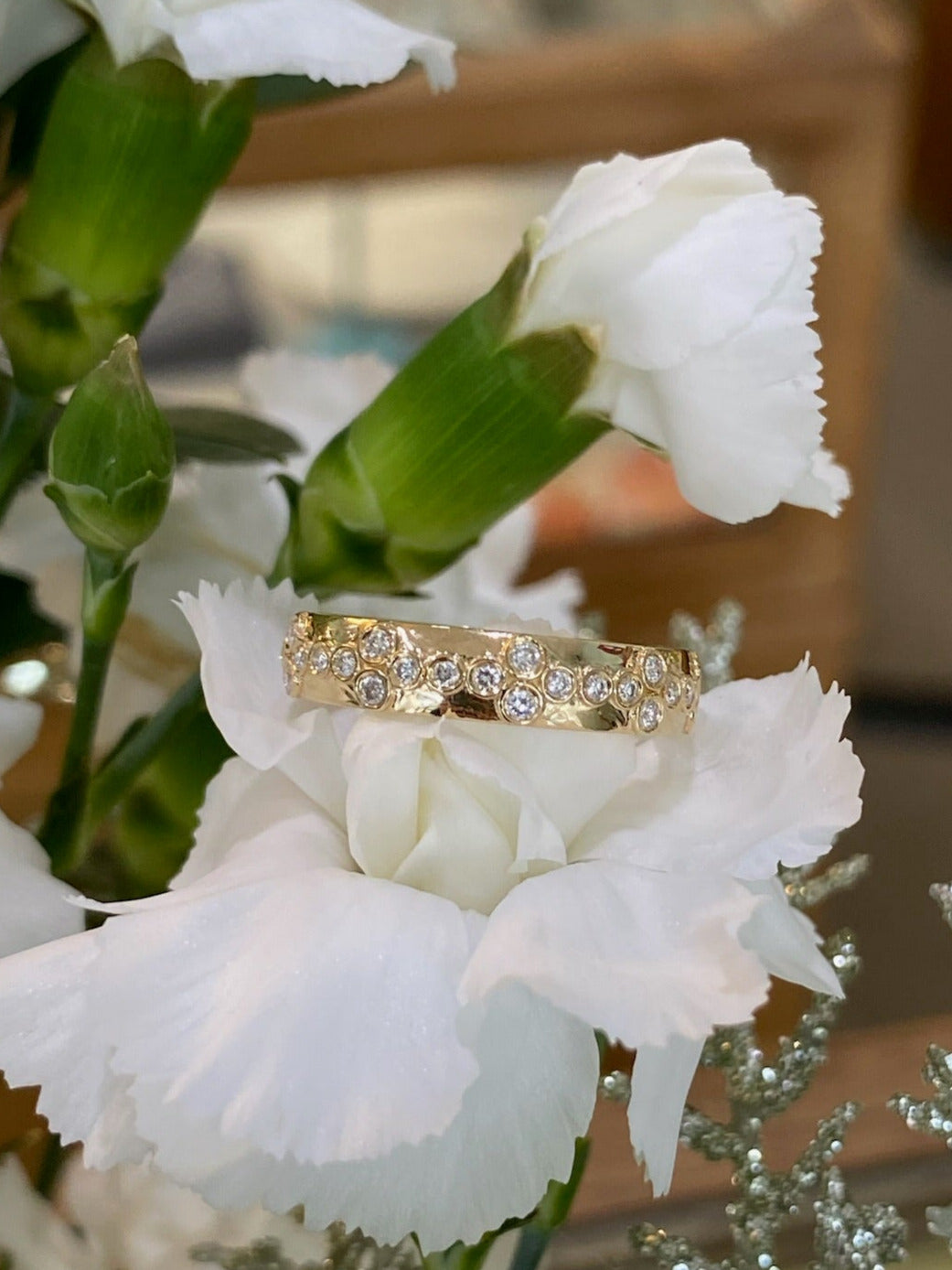 Yellow Gold Bezel Set Floral Pattern Diamond Band