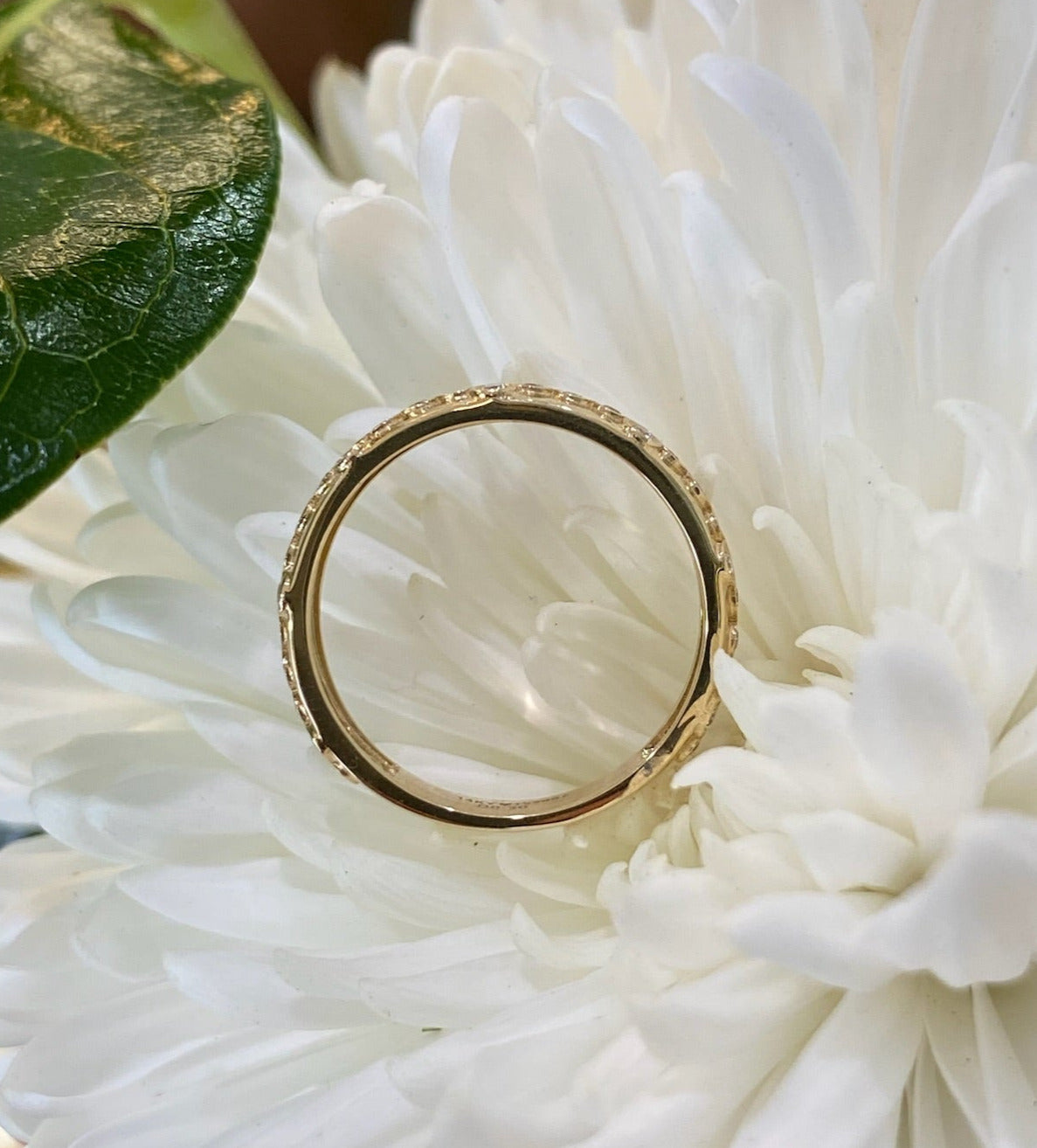 Yellow Gold Bezel Set Floral Pattern Diamond Band