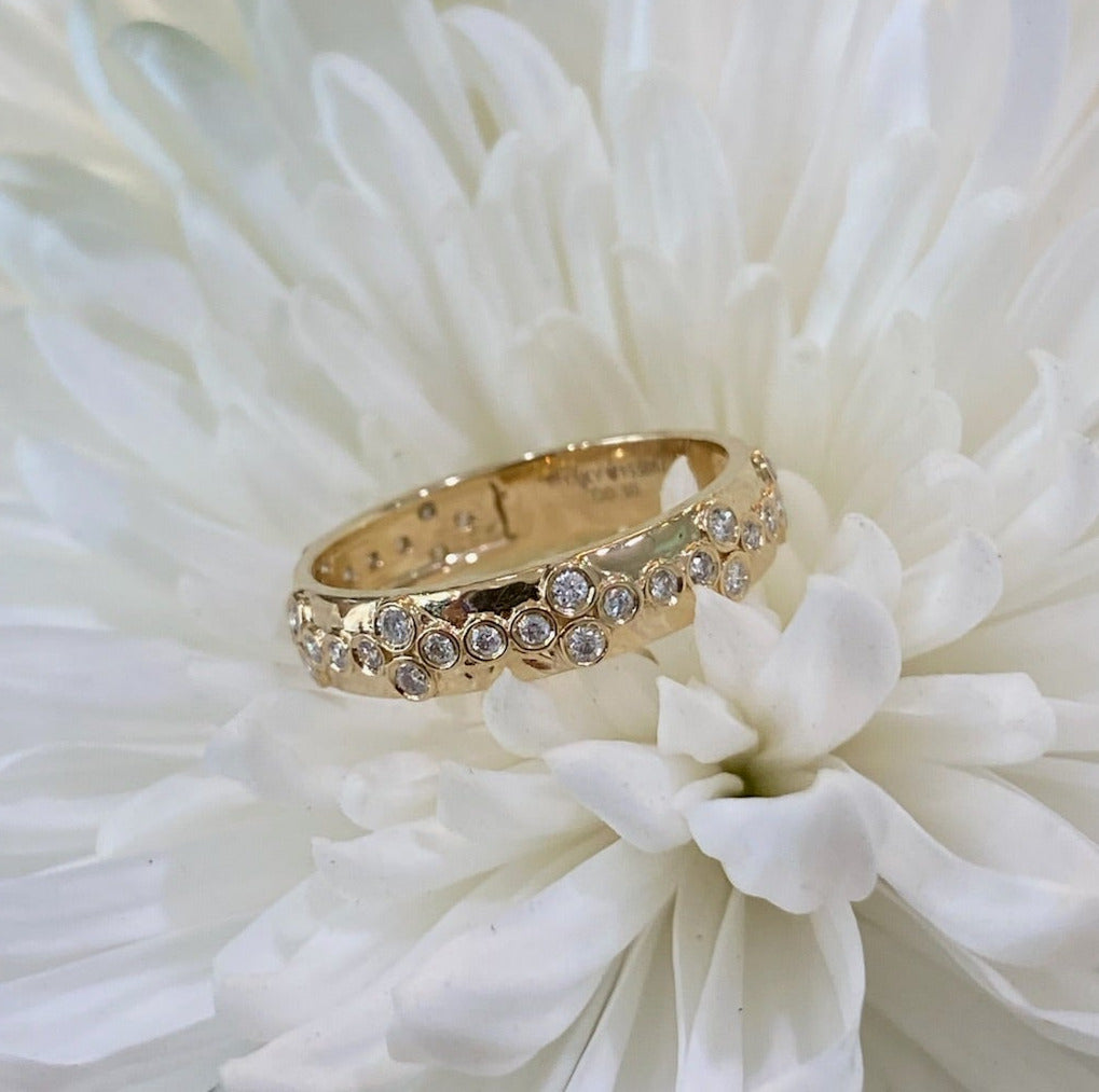 Yellow Gold Bezel Set Floral Pattern Diamond Band