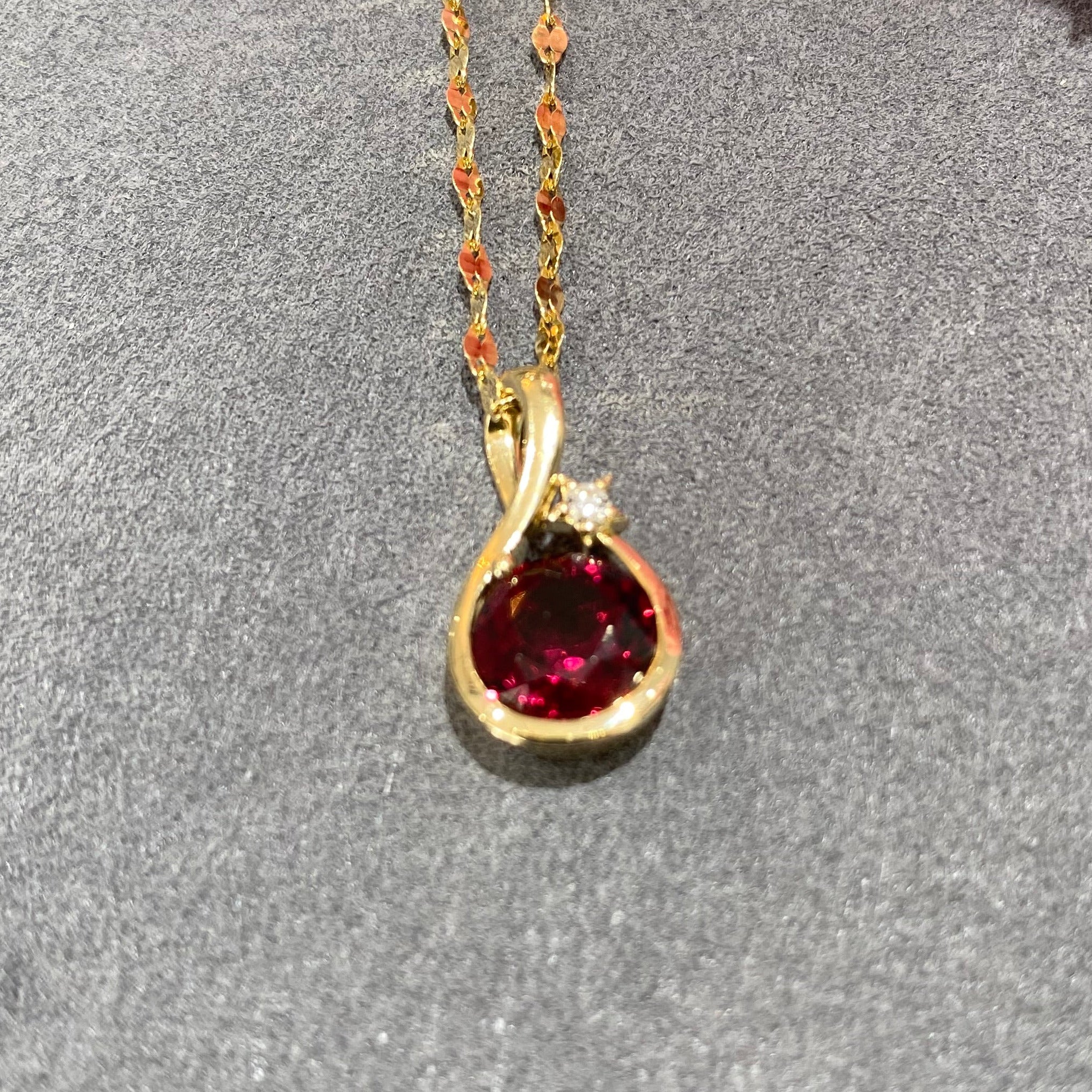 Crimson Orbit Garnet and Diamond Necklace