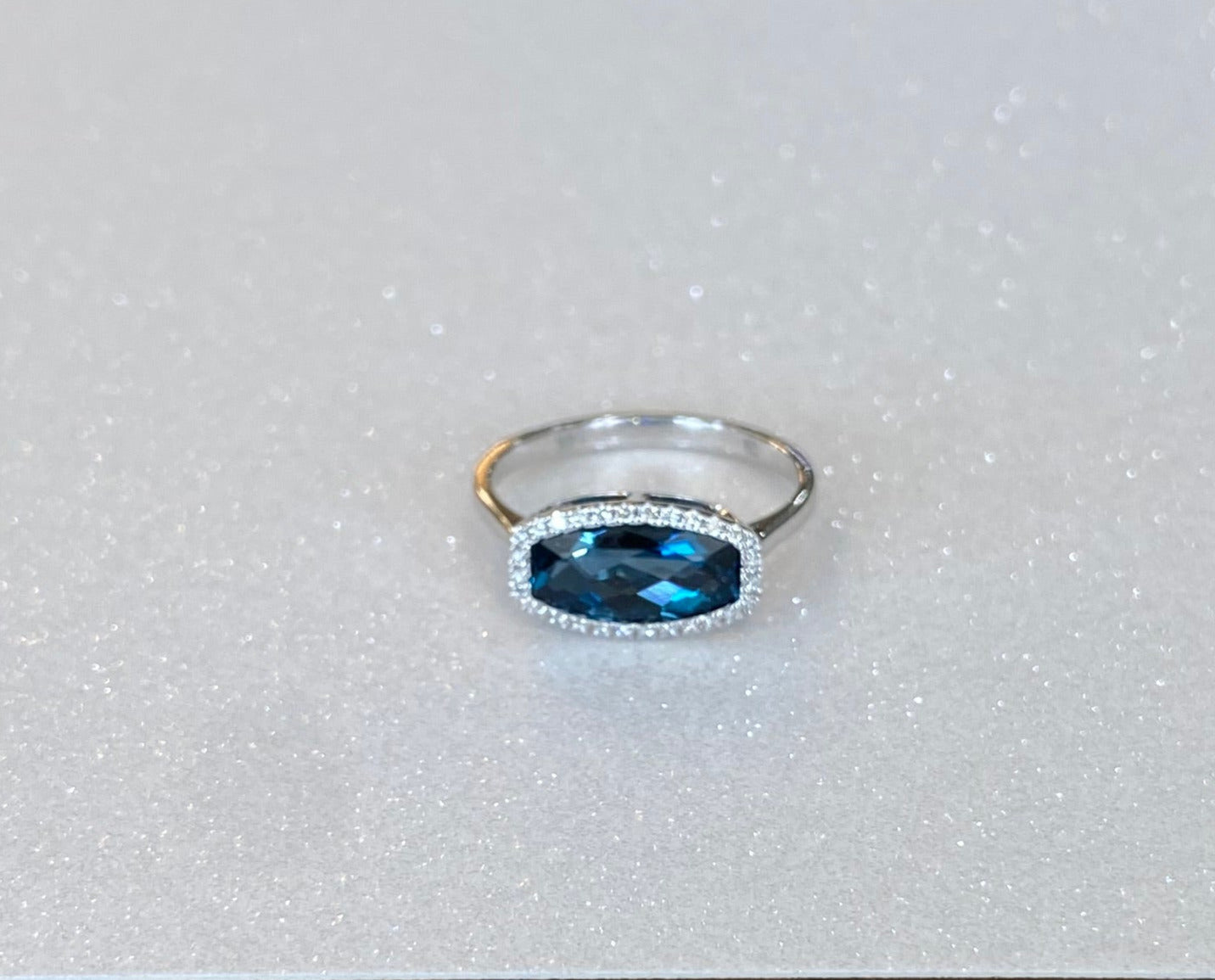 White Gold Deep Blue Topaz and Diamond Ring