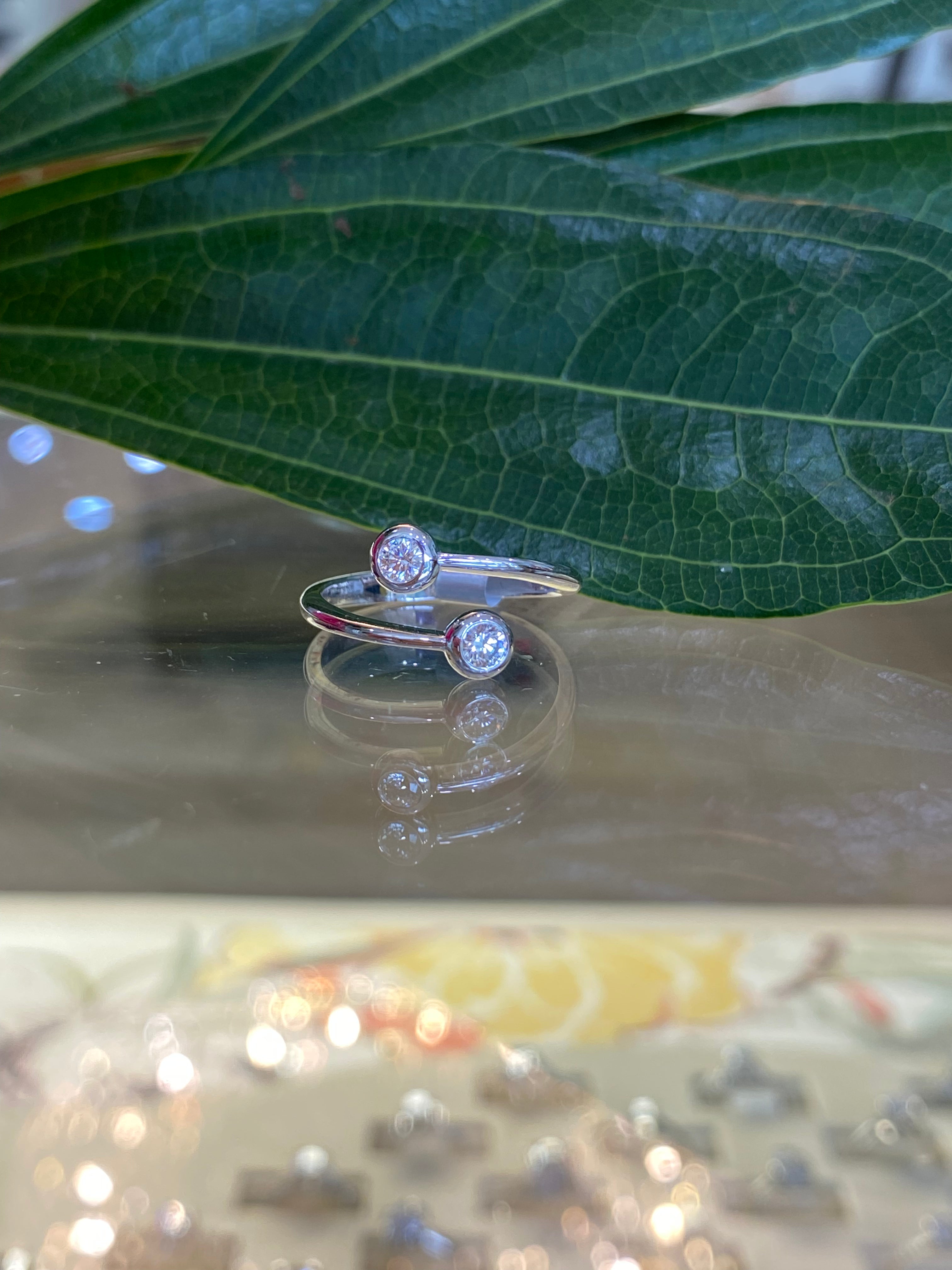 White Gold and Diamond Bypass Style Ring