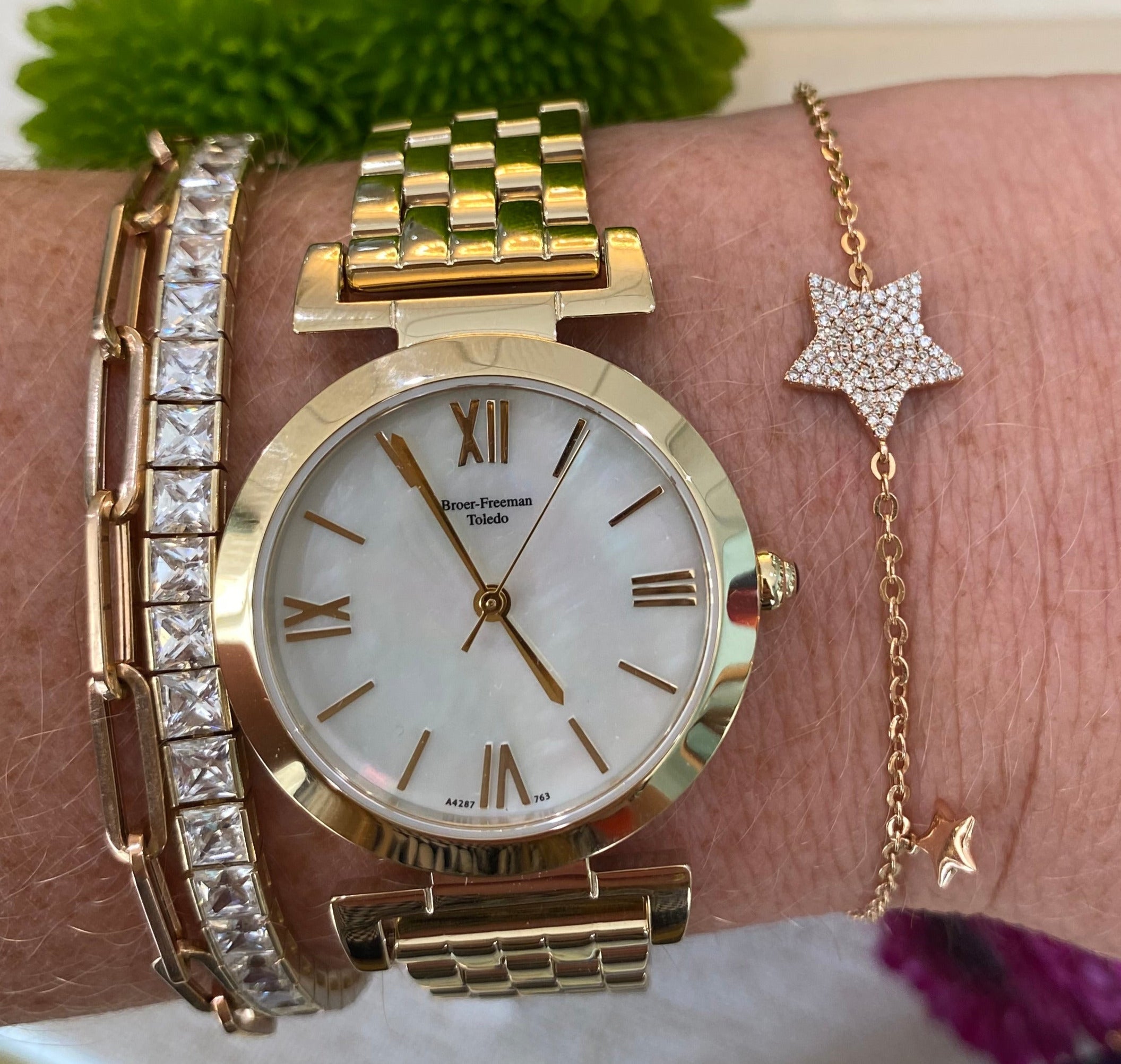 Mother of Pearl Dial Gold Toned Bracelet Watch