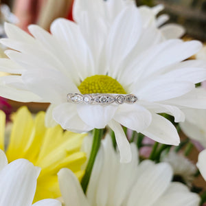 White gold scalloped diamond ring
