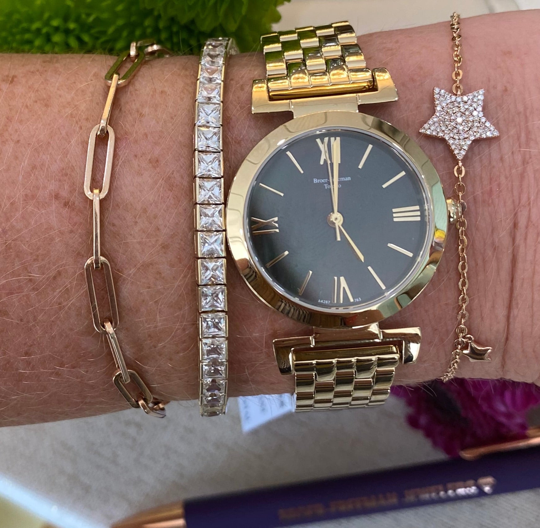 Black Mother of Pearl Dial Gold Toned Bracelet Watch