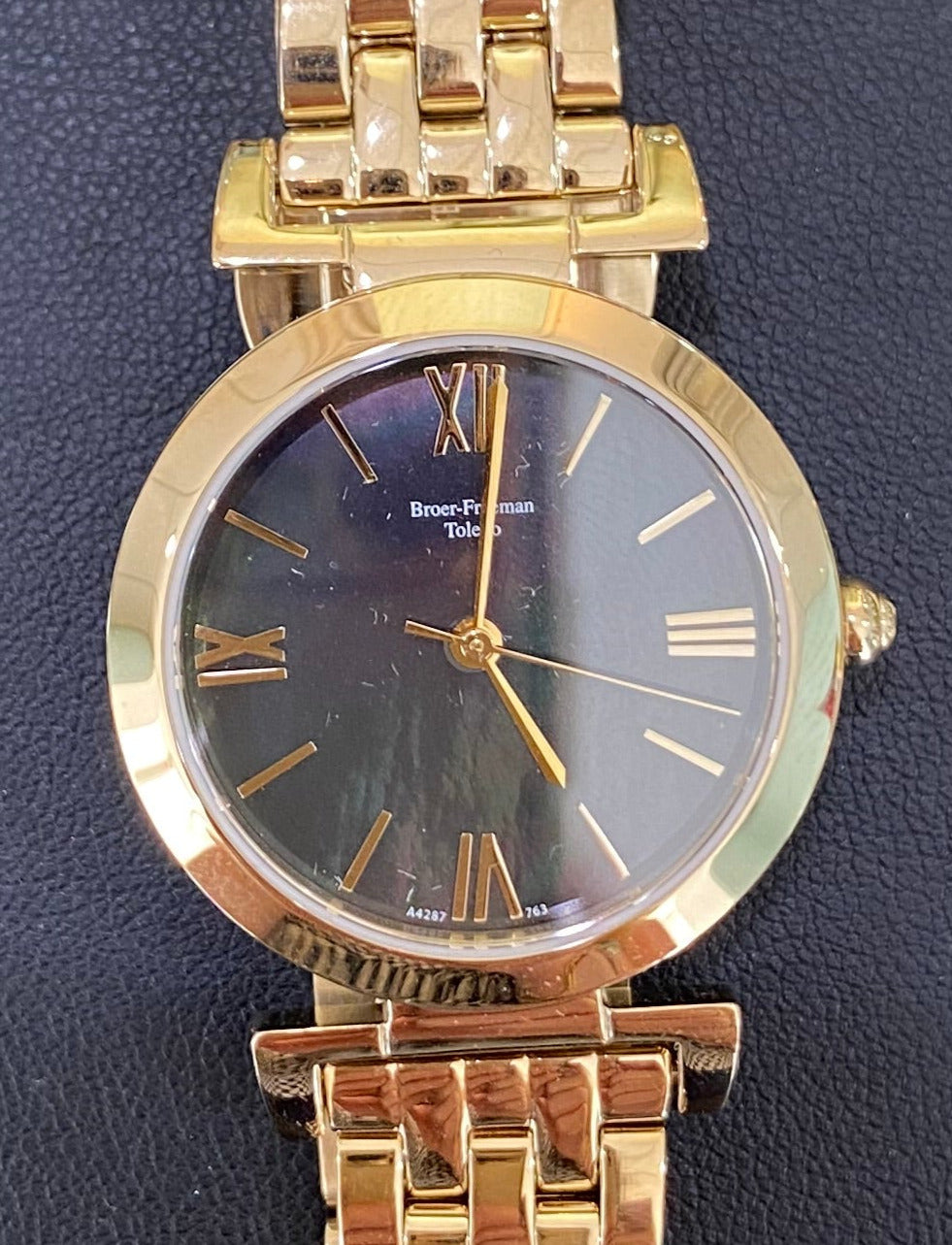 Black Mother of Pearl Dial Gold Toned Bracelet Watch